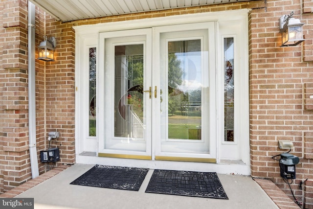 entrance to property featuring french doors