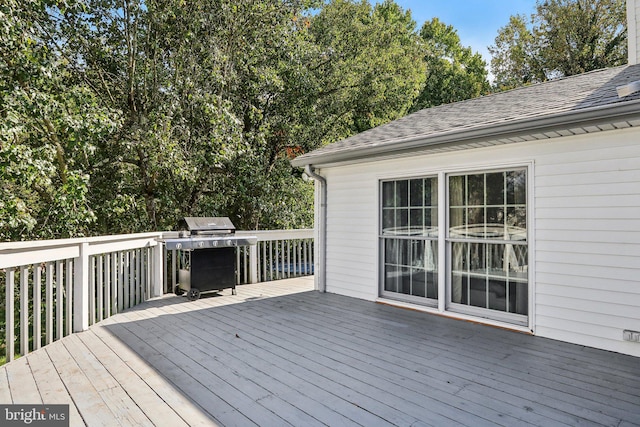 wooden terrace with grilling area