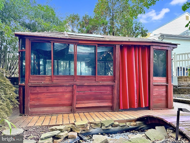 exterior space with a sunroom