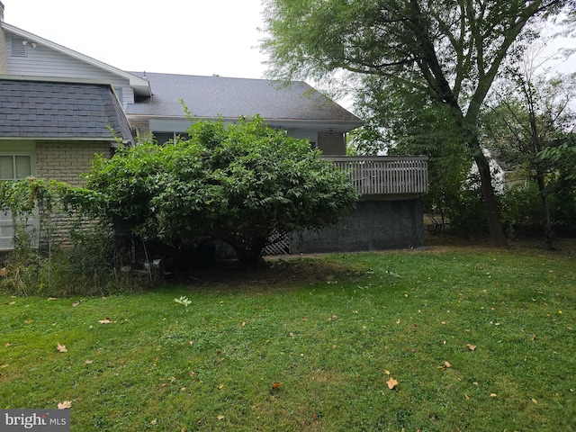 view of yard featuring a deck