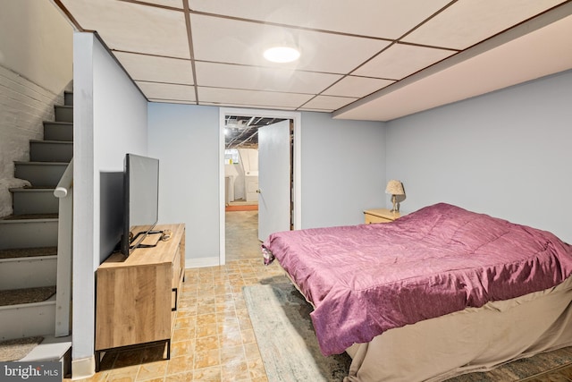 bedroom with a drop ceiling