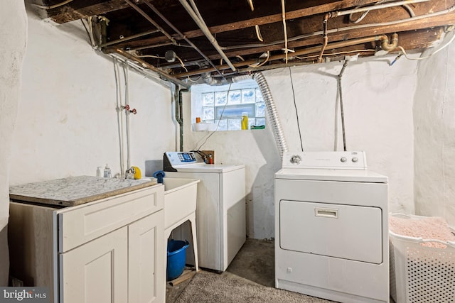 laundry area with washer and clothes dryer