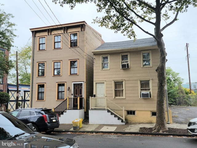 view of front of home with cooling unit