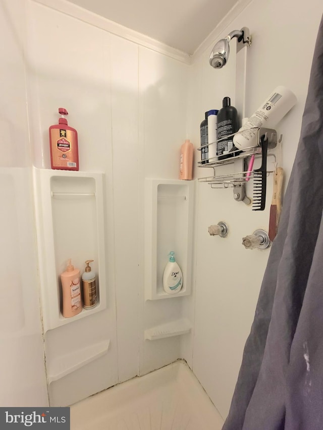 bathroom featuring a shower with curtain