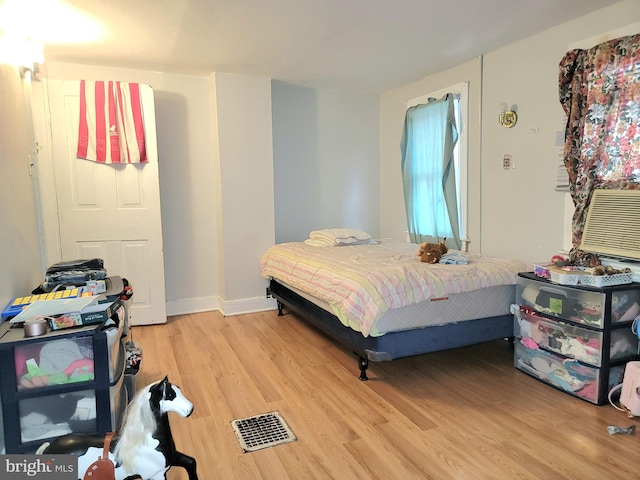 bedroom featuring light hardwood / wood-style floors