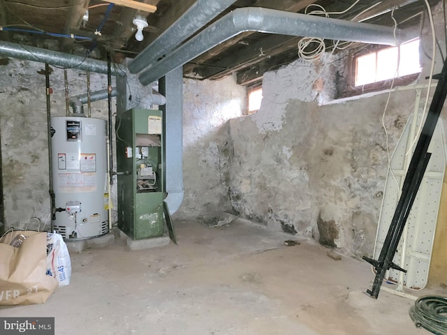 basement with heating unit and gas water heater