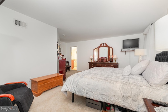 bedroom with light carpet