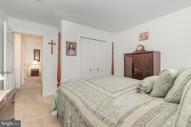 carpeted bedroom featuring a closet