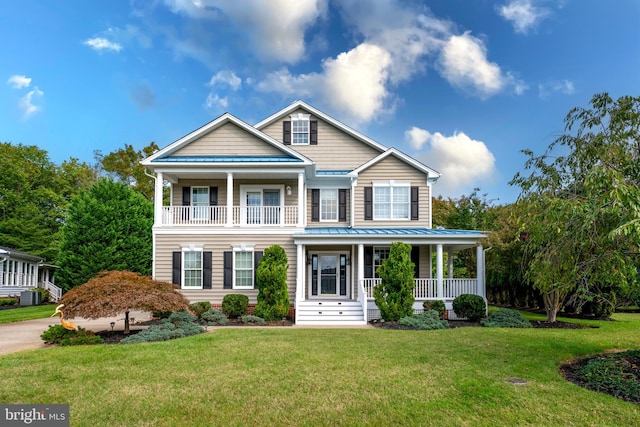 view of front of house featuring a front yard and a porch