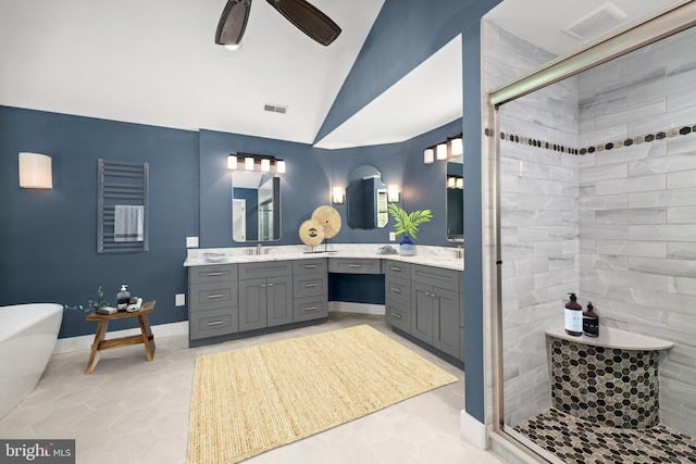 bathroom featuring ceiling fan, plus walk in shower, tile patterned flooring, lofted ceiling, and vanity