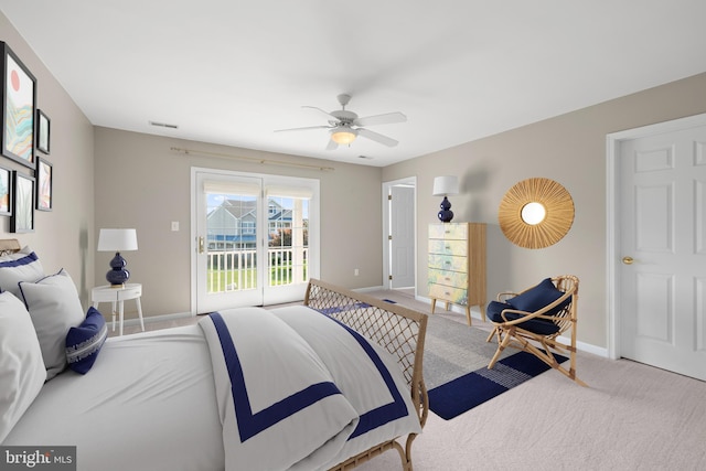 carpeted bedroom with access to exterior and ceiling fan