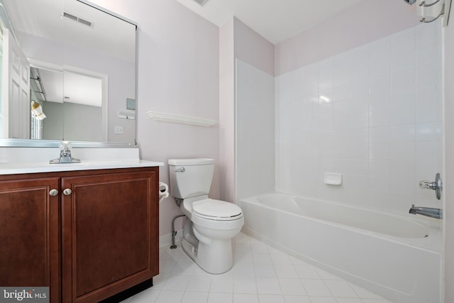 full bathroom featuring vanity, tiled shower / bath combo, and toilet