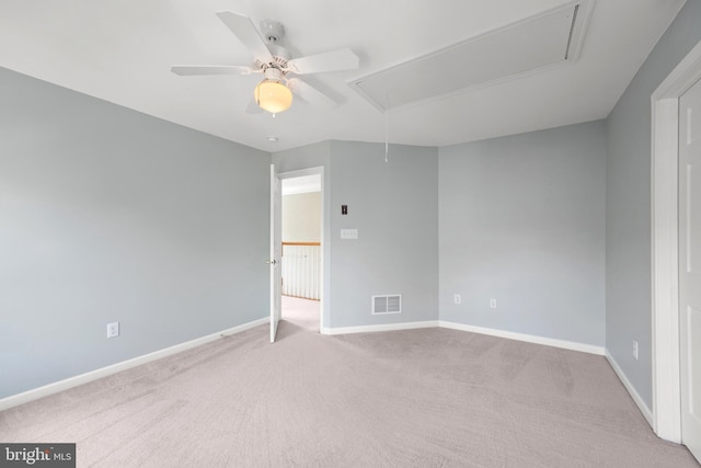 unfurnished room featuring ceiling fan and light colored carpet