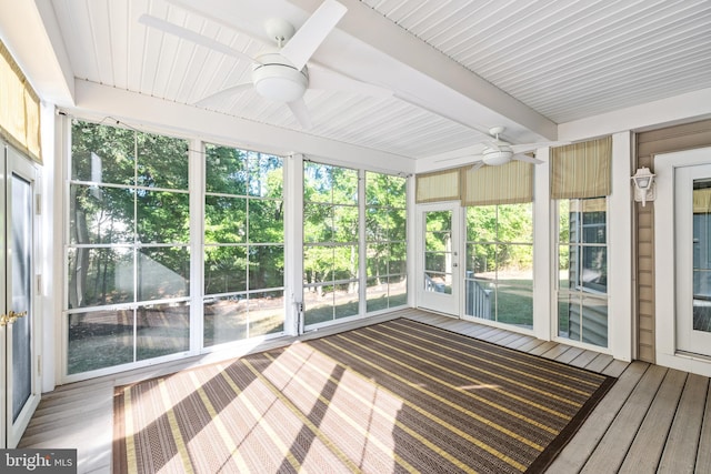 unfurnished sunroom with a wealth of natural light