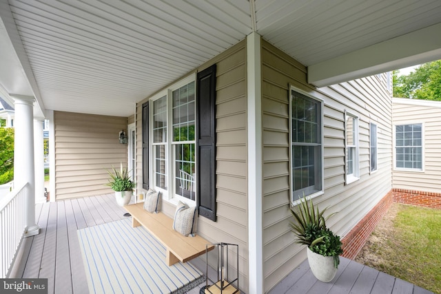 wooden deck featuring a porch