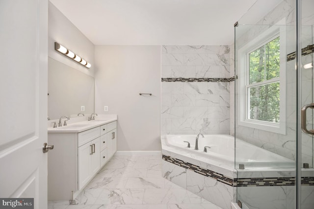 bathroom with separate shower and tub and vanity