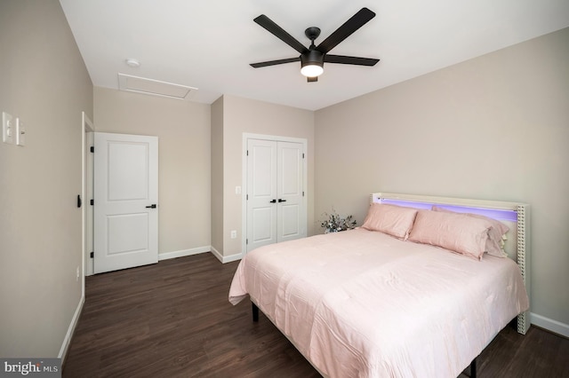 bedroom with ceiling fan, a closet, and dark hardwood / wood-style floors