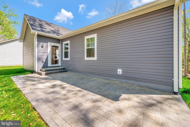 rear view of property with a patio