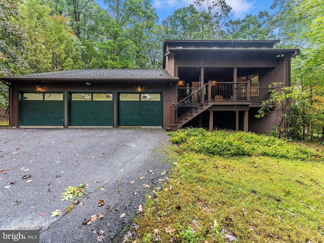 view of front of property featuring a garage