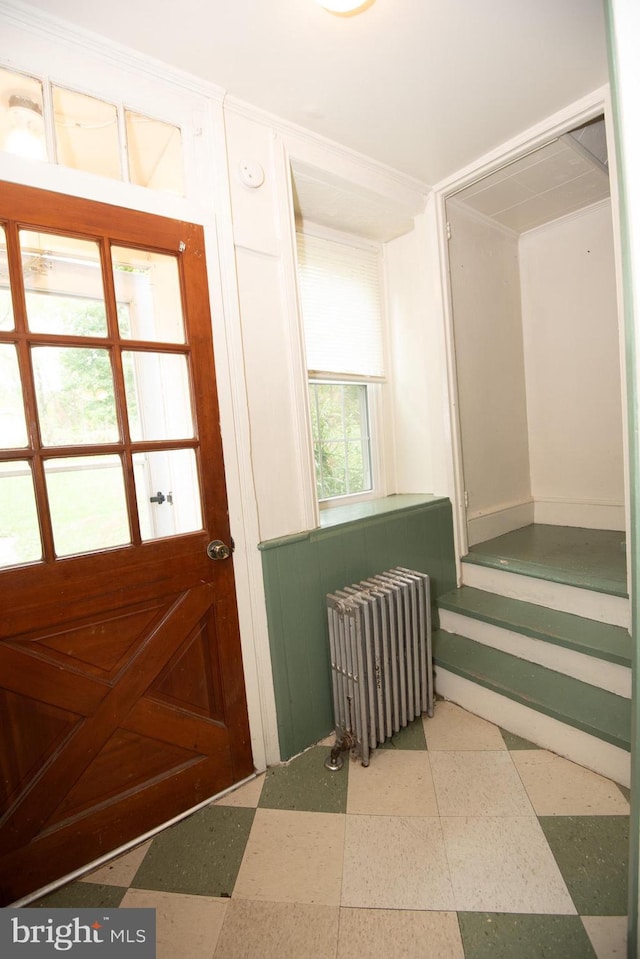 doorway featuring radiator heating unit