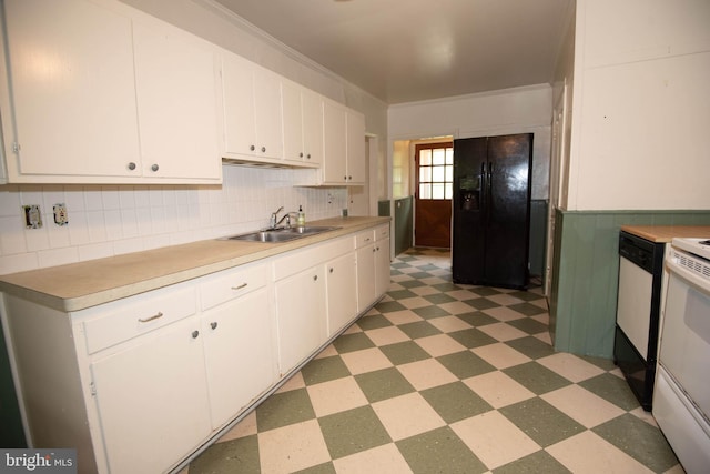 kitchen featuring crown molding, black appliances, white cabinetry, and sink