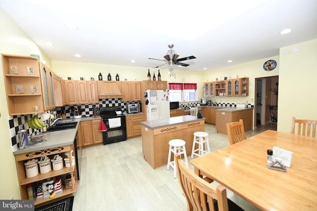 kitchen with open shelves, black electric range oven, white refrigerator with ice dispenser, a center island, and a ceiling fan