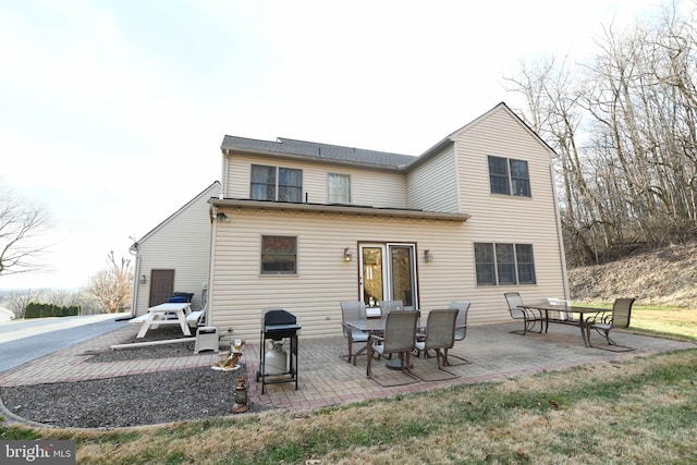 back of house with a patio area