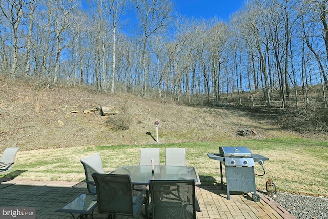 deck featuring a patio and area for grilling