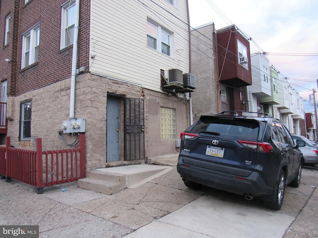 view of building exterior featuring cooling unit