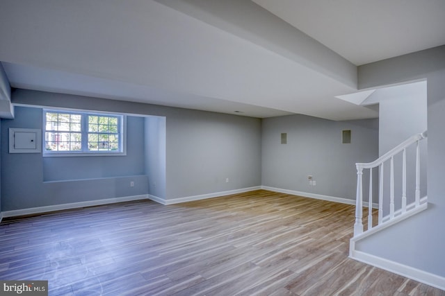 basement featuring light hardwood / wood-style flooring