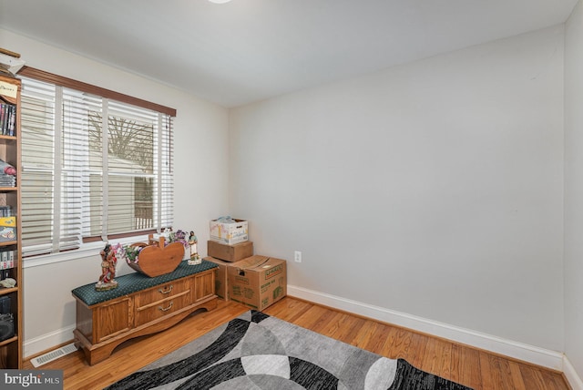 recreation room featuring hardwood / wood-style flooring