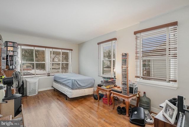 bedroom with light hardwood / wood-style floors