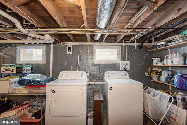 laundry room with separate washer and dryer