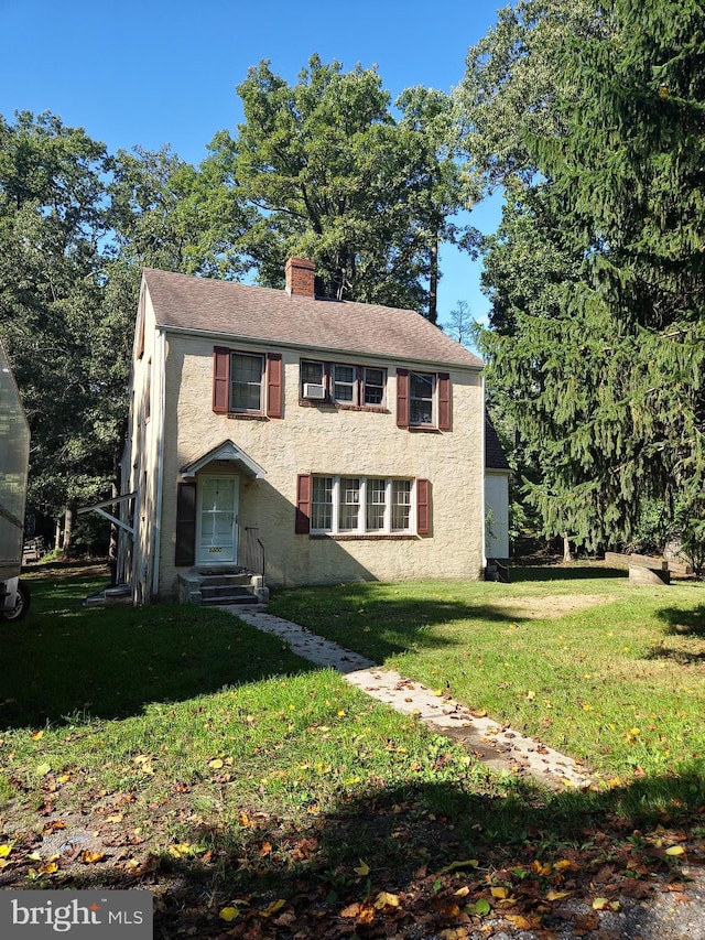 view of front of house with a front yard