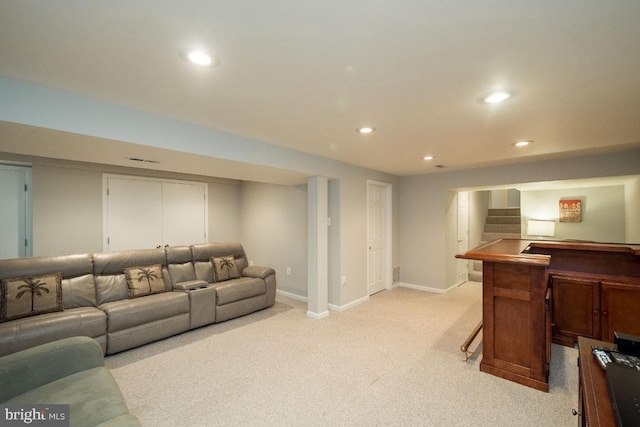 living room featuring light carpet