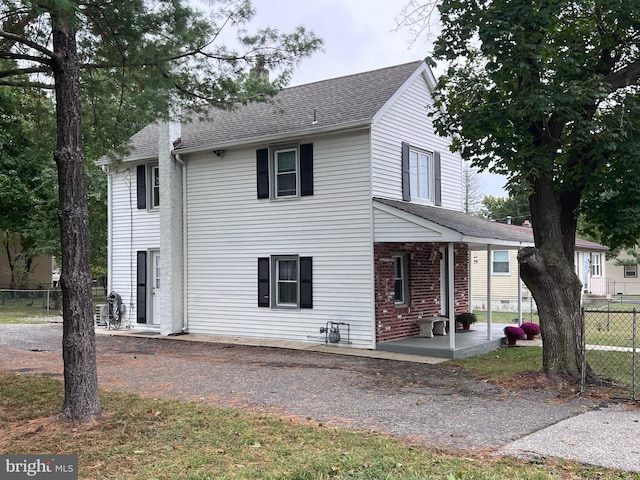 front of property with a patio area