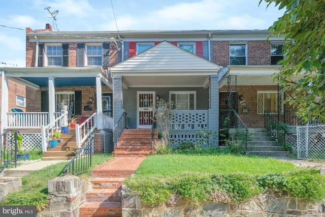 view of property with covered porch