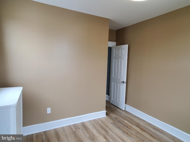 empty room with light wood-type flooring