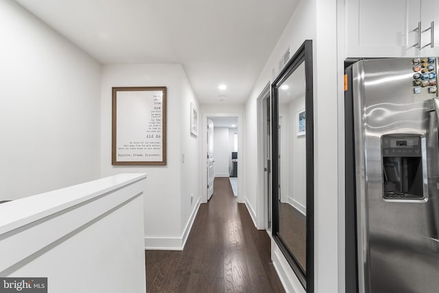 hallway featuring dark hardwood / wood-style floors