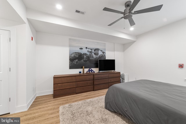 bedroom featuring light hardwood / wood-style floors and ceiling fan