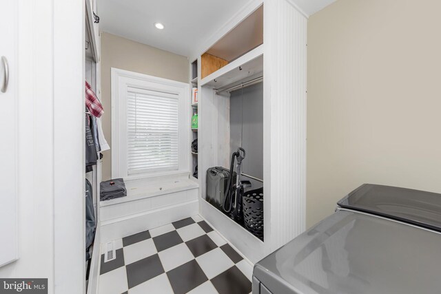 laundry room with separate washer and dryer