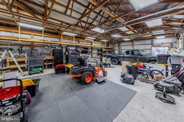 garage featuring black fridge