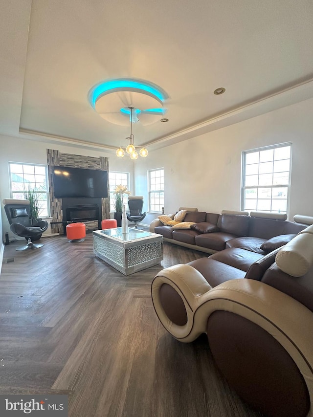 living room featuring hardwood / wood-style floors and an inviting chandelier