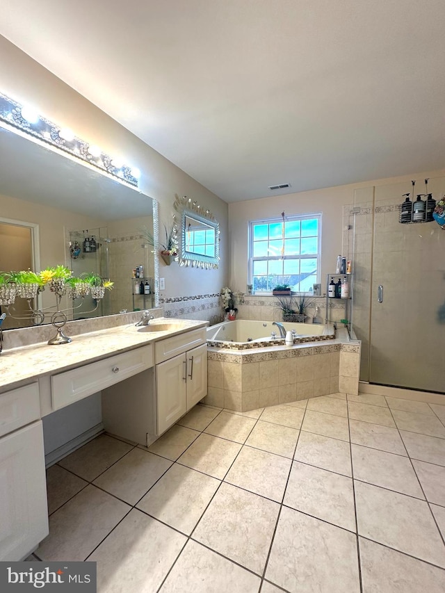 bathroom with vanity, tile patterned flooring, and separate shower and tub