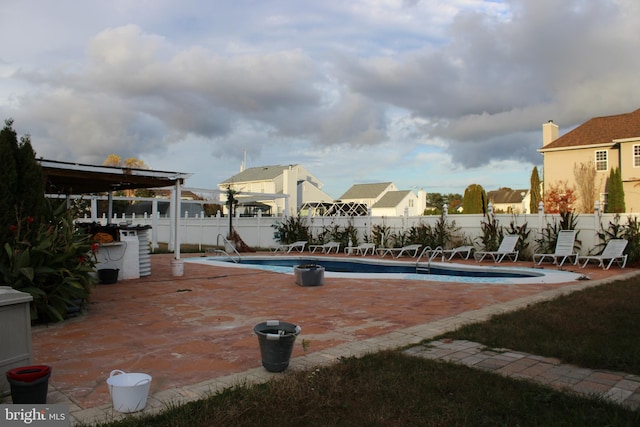 view of pool with a patio area