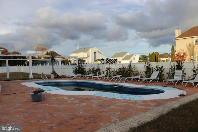 view of pool with a patio