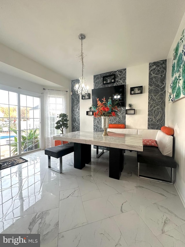 dining area with a chandelier