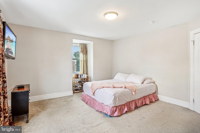 bedroom featuring carpet floors