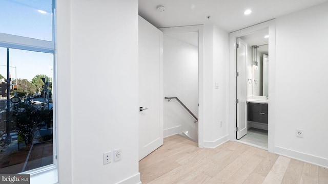 bathroom with vanity and wood-type flooring