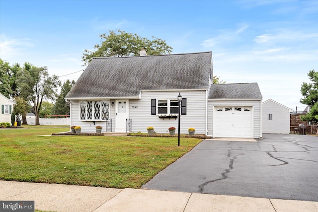 cape cod-style house with a front yard and a garage